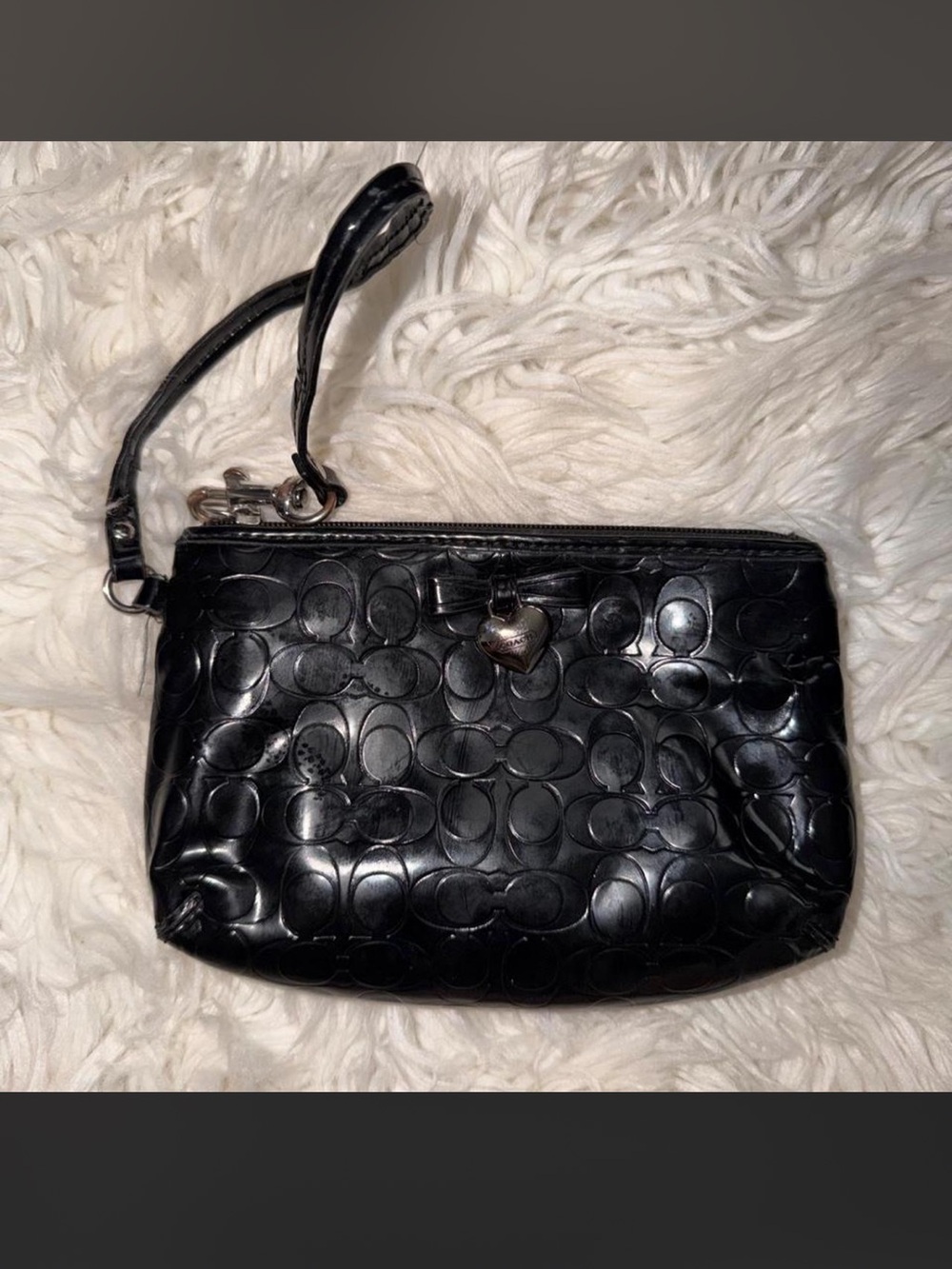 Coach Black Embossed Signature Wristlet with Heart Charm